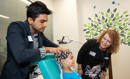 Dr Kartik Iyer (L) and Associate Professor Karen Barlow (R) in the KidStim Lab